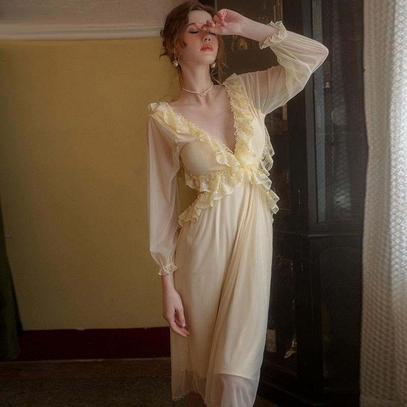 Introducing the Robe du Soir Jeannie, a French-inspired nightgown that exudes elegance and vintage charm. Slip into this luxurious piece and indulge in a taste of luxury, reminiscent of a bygone era. Let the intricate details and French style transport you to a world of sophistication and refinement. Truly a must-have for any discerning individual.