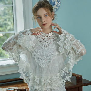 Indulge in sophistication with our Robe Britta. The perfect blend of vintage and modern, this elegant robe features intricate lace patchwork and delicate embroidery. Designed for the most discerning women, it's a unique addition to any wardrobe. Perfect for spring and fall, this is a must-have for any Victorian-inspired look.