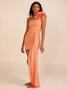 Expertly designed by fashion designer Maygel Coronel, the Dress Miramar is a bright orange, one shoulder dress that exudes sexiness. The dress features a unique stereo flower design and ruched detailing, making it a must-have for any fashion-forward woman. Its sleeveless design adds a touch of elegance, making it perfect for any occasion. Stand out in style with the Dress Miramar.