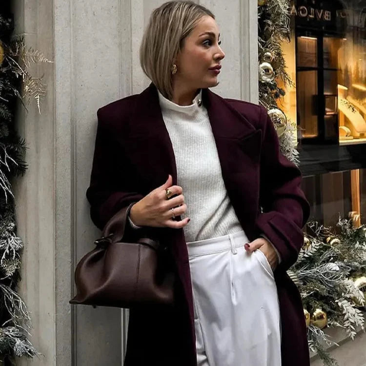 Stay warm and stylish with Manteaux Jade. Made with high-quality wool, this elegant coat offers both fashion and function. The solid color and vintage design are perfect for any occasion, while the thick material and turn-down collar ensure warmth and comfort. A must-have for any fashionable woman!