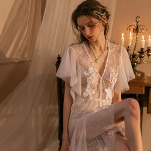 Indulge in pure luxury with Nightgown Alisa. This elegant bridal gown exudes sophistication and is crafted with the finest materials. Feel like a queen on your special day with this exquisite nightgown.