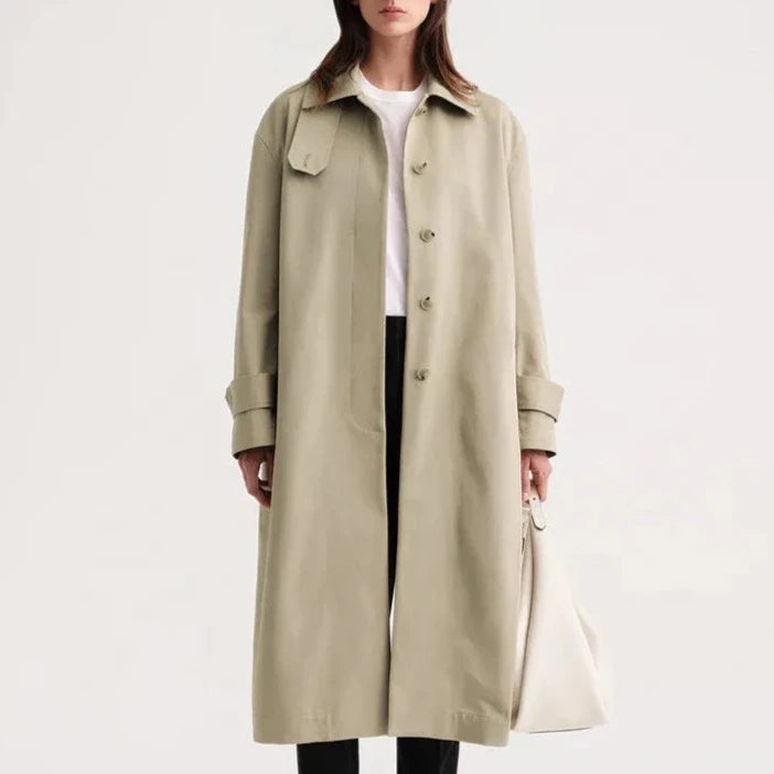 Elevate your outerwear with the TOTEME Signature trench khaki. Crafted from durable cotton, this long coat exudes a vintage classic vibe. With a stand collar and long version, stay warm and stylish in any weather. A must-have for fashion-forward individuals.