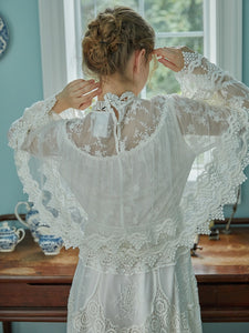 Indulge in sophistication with our Robe Britta. The perfect blend of vintage and modern, this elegant robe features intricate lace patchwork and delicate embroidery. Designed for the most discerning women, it's a unique addition to any wardrobe. Perfect for spring and fall, this is a must-have for any Victorian-inspired look.