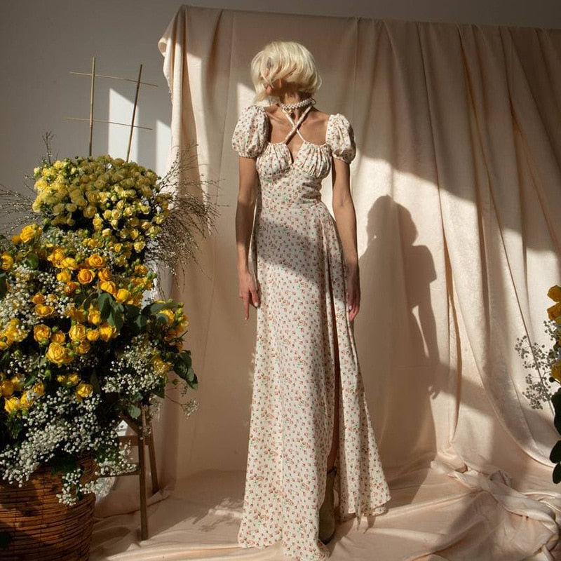 Introducing Robe Milena - the epitome of elegance and sophistication. This maxi dress boasts a chic, floral design that exudes luxury and refinement. Elevate any occasion with this timeless piece that will make you feel like a work of art.