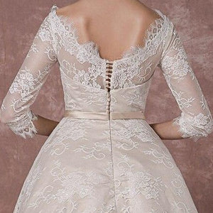 Introducing the Robe Mayze - the perfect vintage lace wedding gown for your special day. Hand-crafted with intricate details, this gown exudes elegance and charm. Dazzle your guests and feel confident as you walk down the aisle.