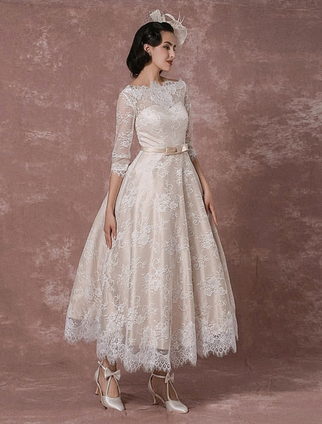 Introducing the Robe Mayze - the perfect vintage lace wedding gown for your special day. Hand-crafted with intricate details, this gown exudes elegance and charm. Dazzle your guests and feel confident as you walk down the aisle.