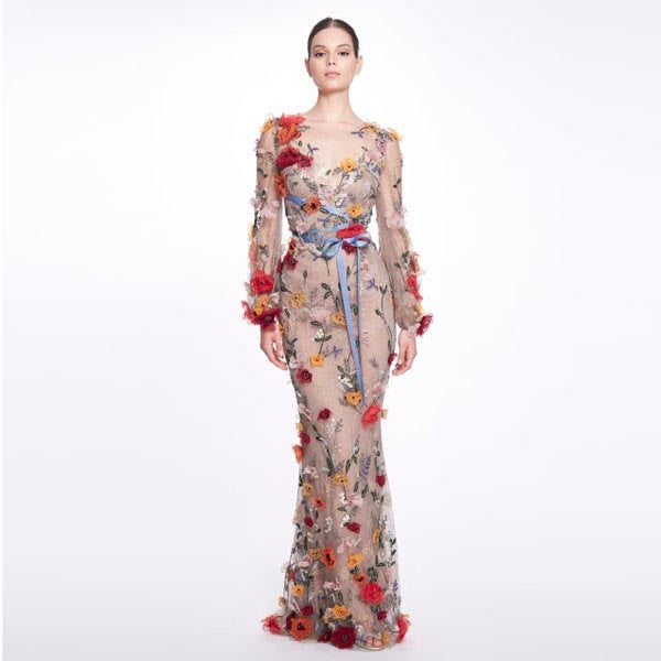 Indulge in luxury with the Robe Calandre featuring the breathtaking MARCHESA design and exquisite floral appliqués. Perfect for any special occasion, this gown showcases the perfect combination of elegance and beauty. Made from high-quality materials, this gown is sure to make a lasting impression.